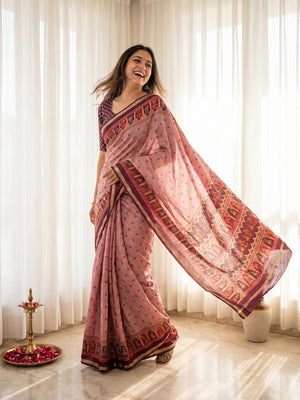 Elegant Peach Viscose Saree with Fancy Print and Rich Zari Border - Image 1