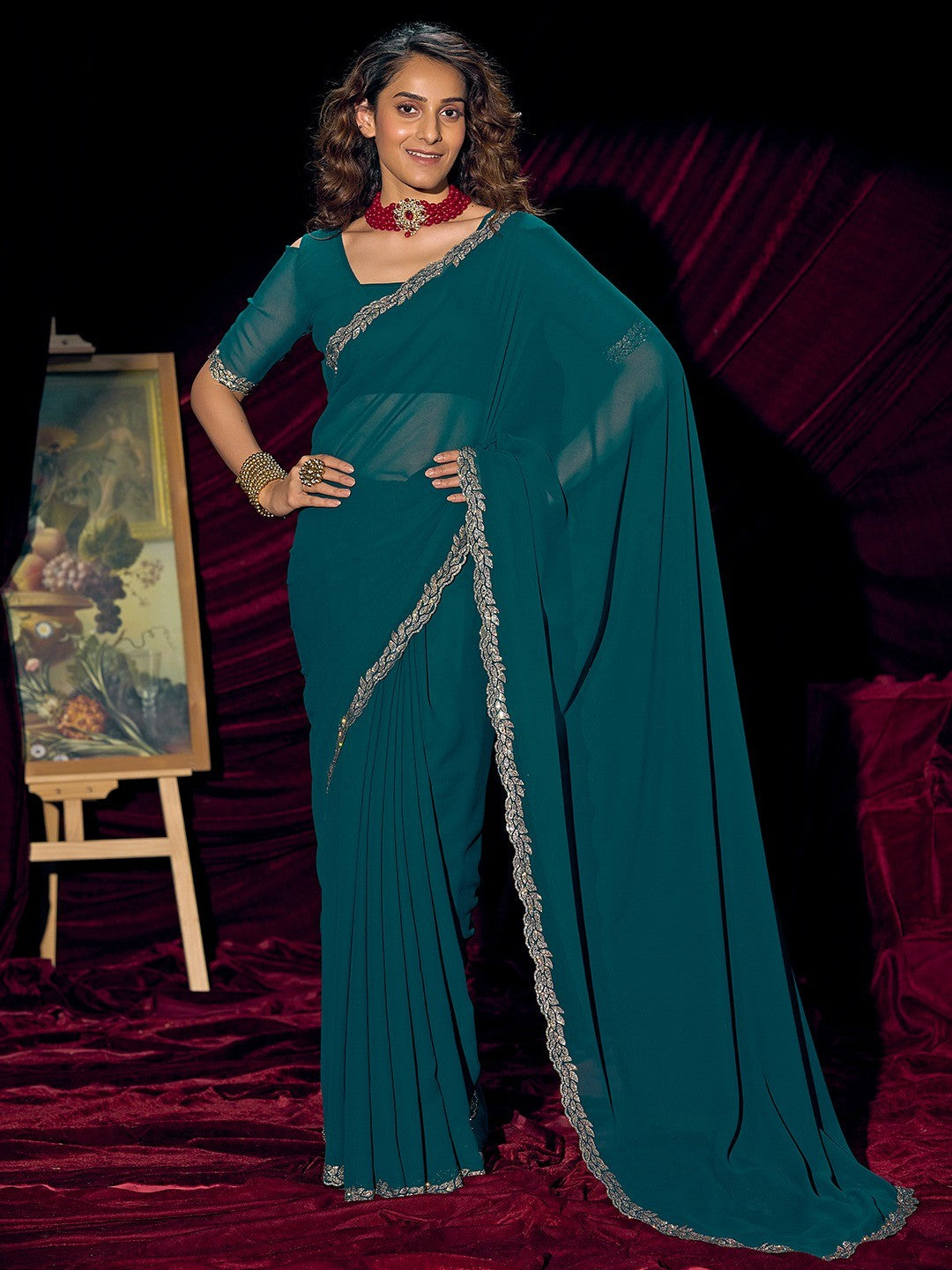 Glamorous Teal Solid Georgette Saree Featuring Embellished Stone Border Work - Image 1