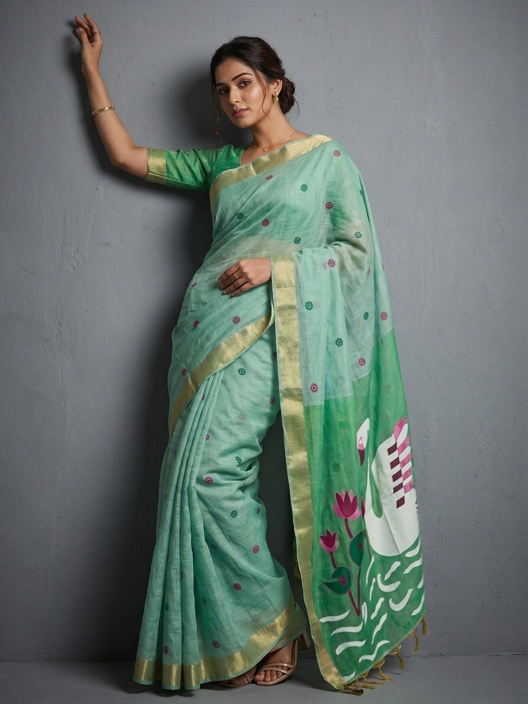 Elegant Sea Green Linen Saree with Floral Prints and Swan Motif Pallu - Image 1