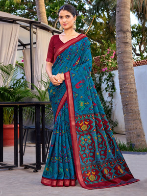 Teal Tussar Silk Saree with Elegant Ikkat Motifs and Modern Styling - Image 1