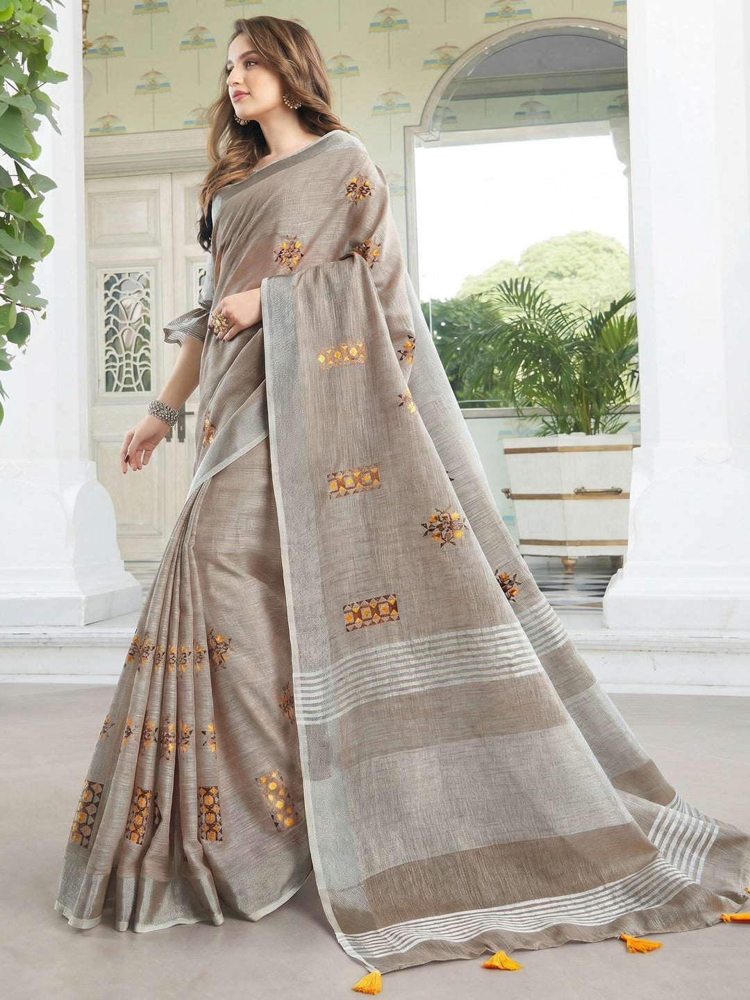 Classy Pastel Brown Colored Casual Wear Floral Embroidered Linen-Cotton Saree With Tassels - Image 2