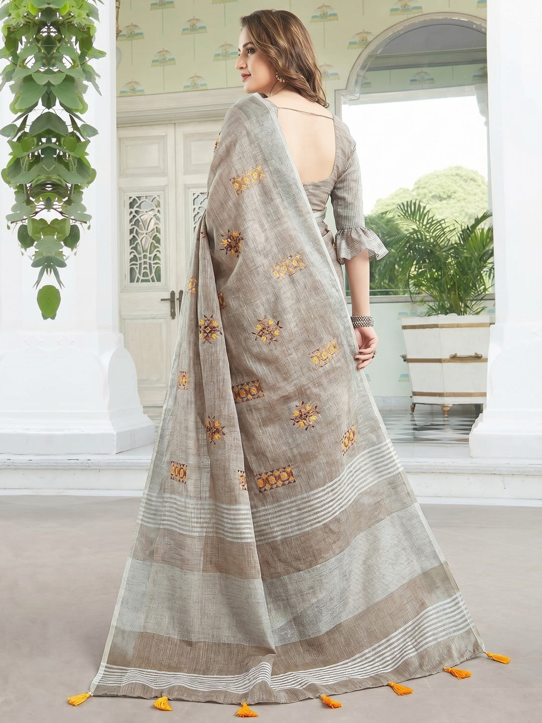 Classy Pastel Brown Colored Casual Wear Floral Embroidered Linen-Cotton Saree With Tassels - Image 3