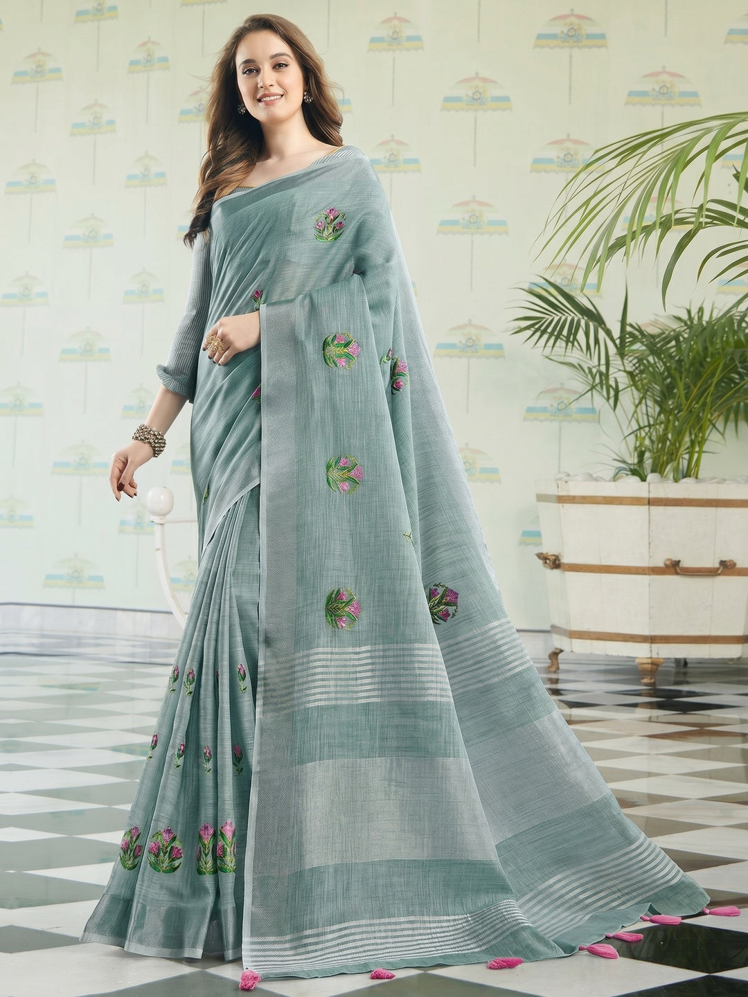Intricate Pastel Blue Colored Casual Wear Floral Embroidered Linen-Cotton Saree With Tassels - Image 1
