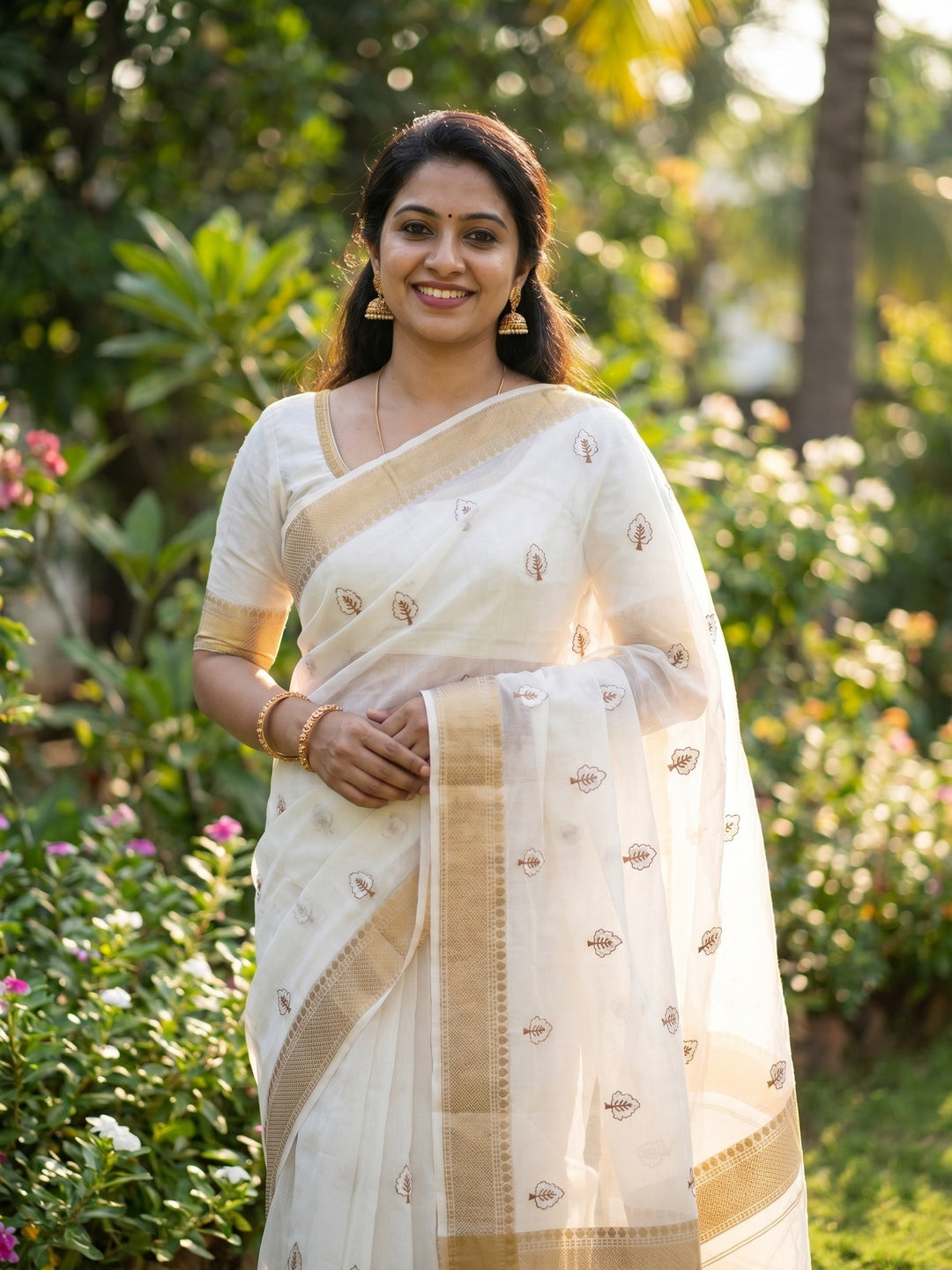 White Floral Embroidered Cotton Silk Saree Woven Border