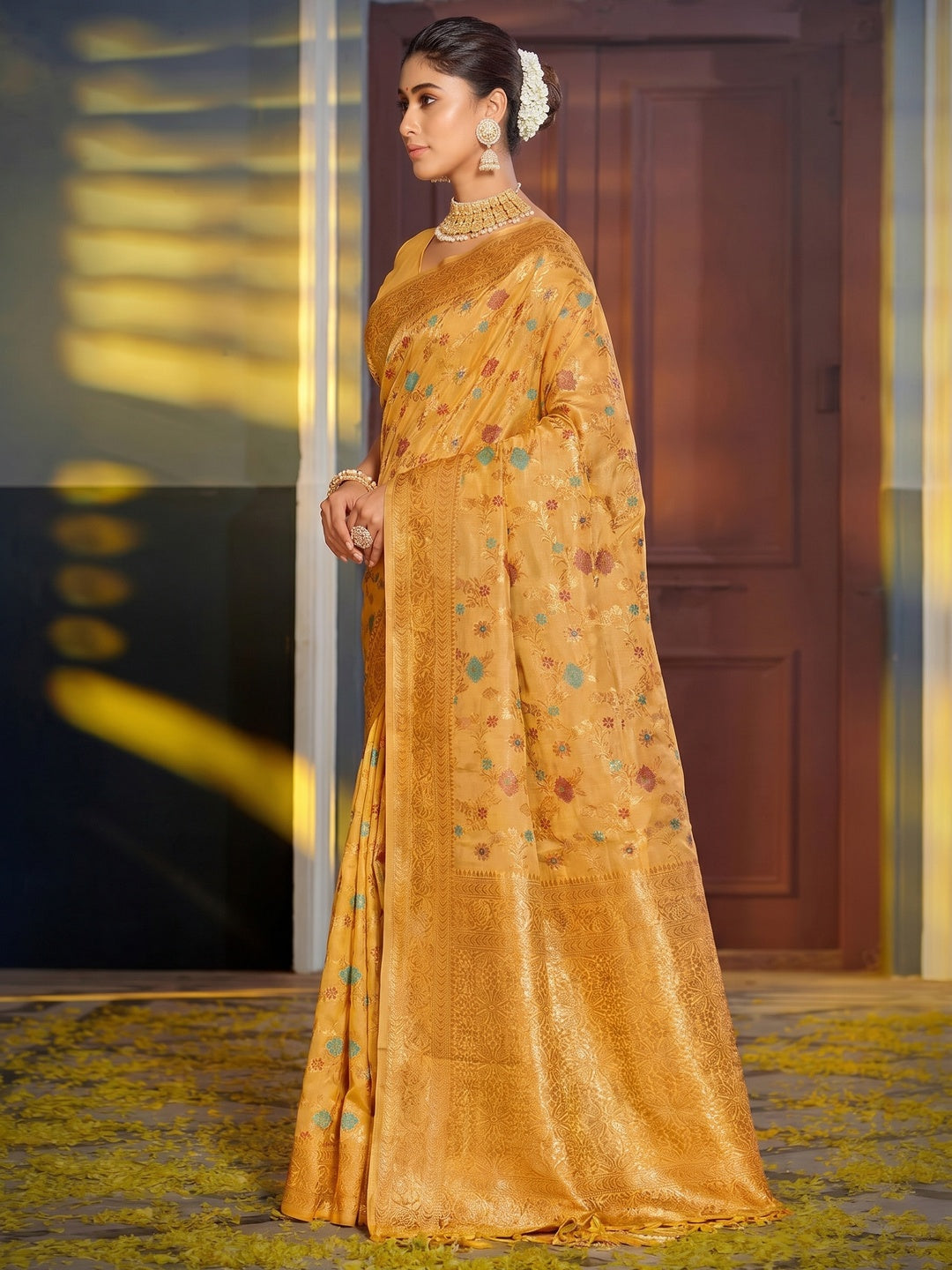 Mustard Floral Woven Banarasi Silk Saree With Tassels - Image 1