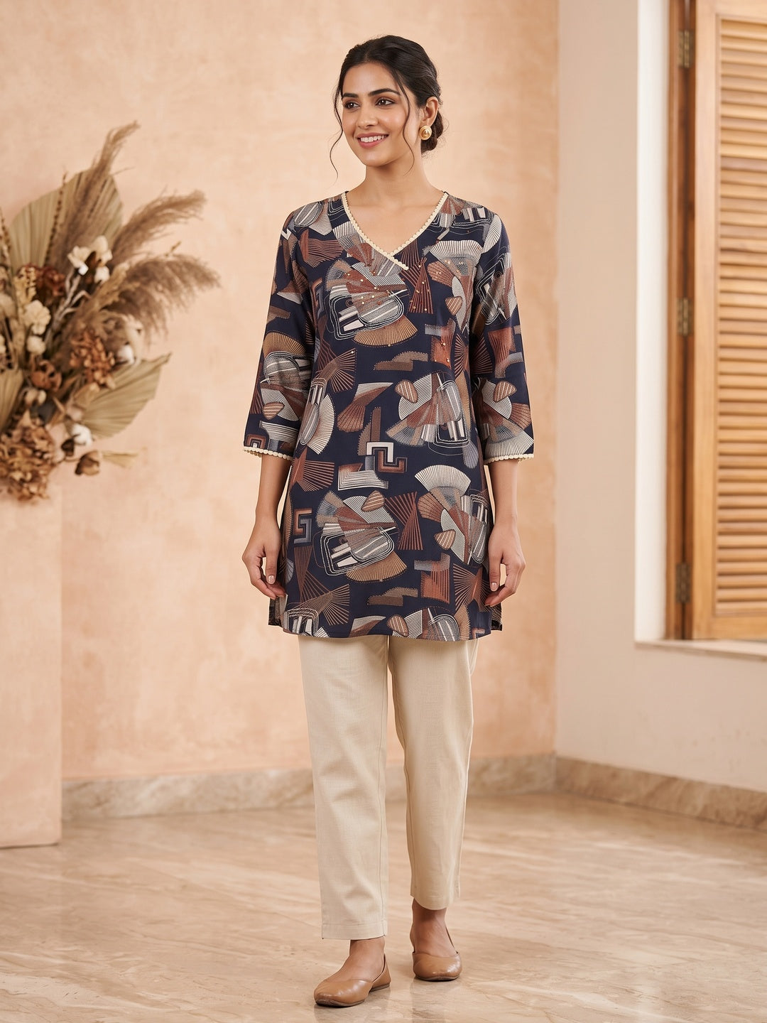 Navy Blue Rayon Abstract Printed Embellished A-Line Top - Image 1