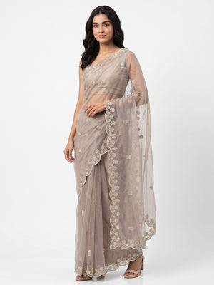 Beige Net Partywear Saree Featuring Fine Floral Embroidery and a Soft, Flowing Look - Image 1