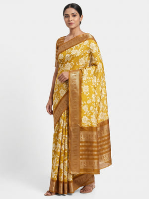 Luxurious Mustard Floral Print Dola Silk Saree With Intricate Peacock Motif Zari Woven Border - Image 1