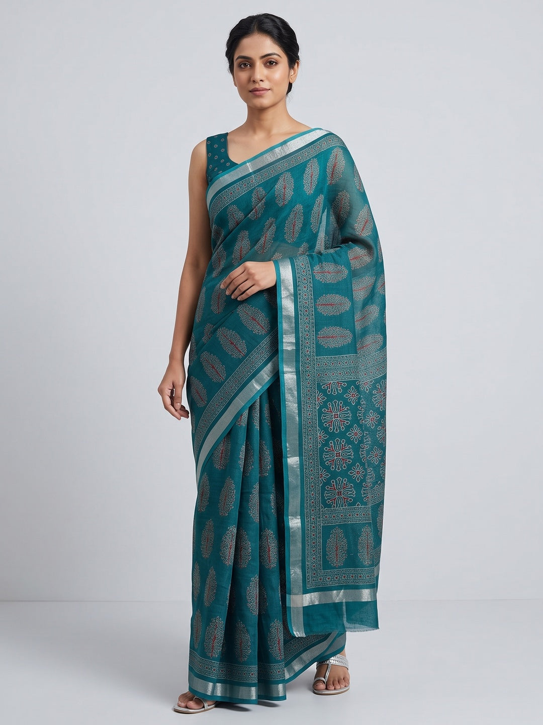Classic Teal Linen Cotton Saree Featuring Floral Ajrakh Print & Rich Silver Zari Border - Image 1
