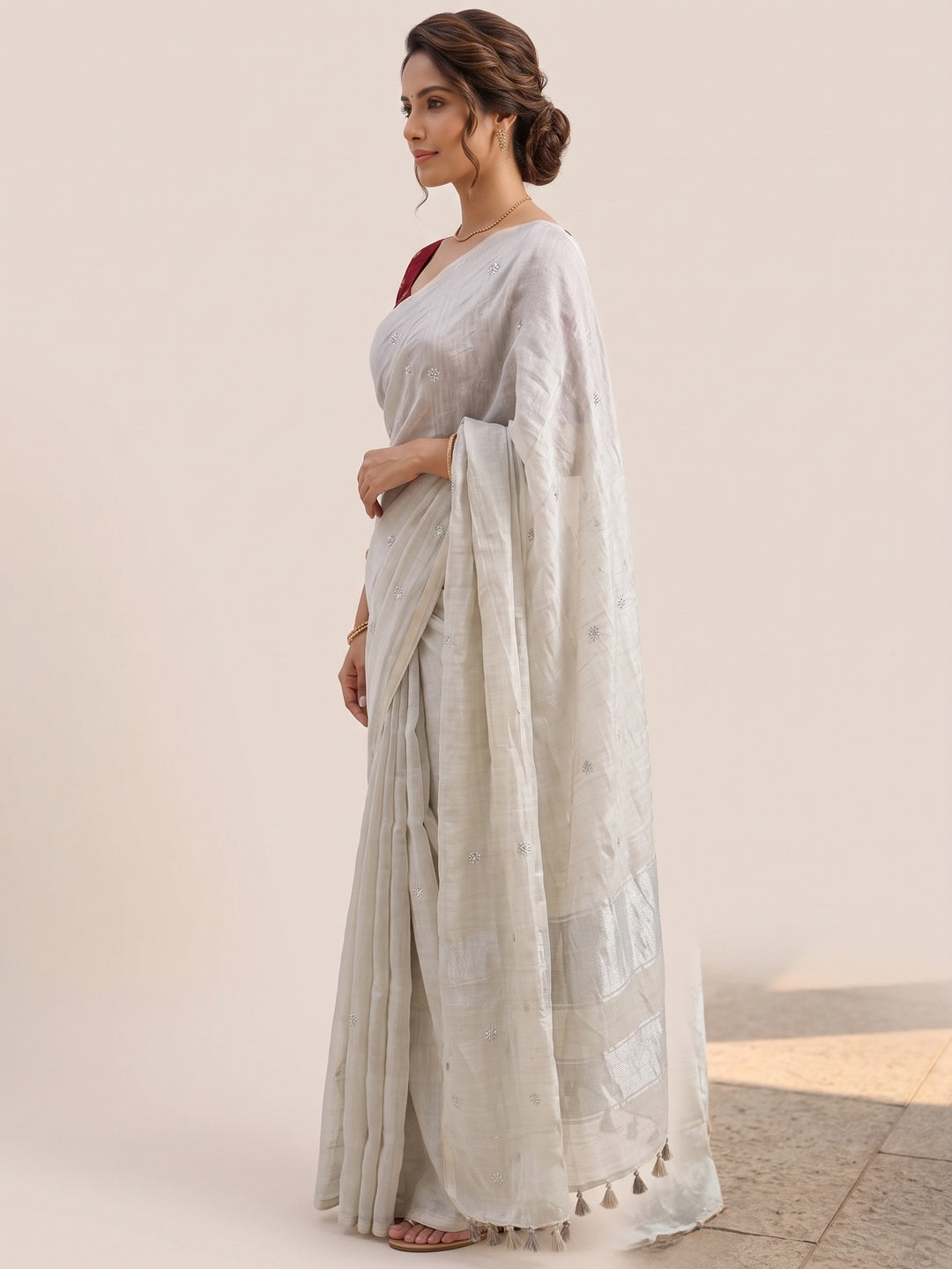 Elegant Cream Organza Satin Silk Saree Featuring Floral Butti Sequins Embroidery & Tassel Pallu - Image 9