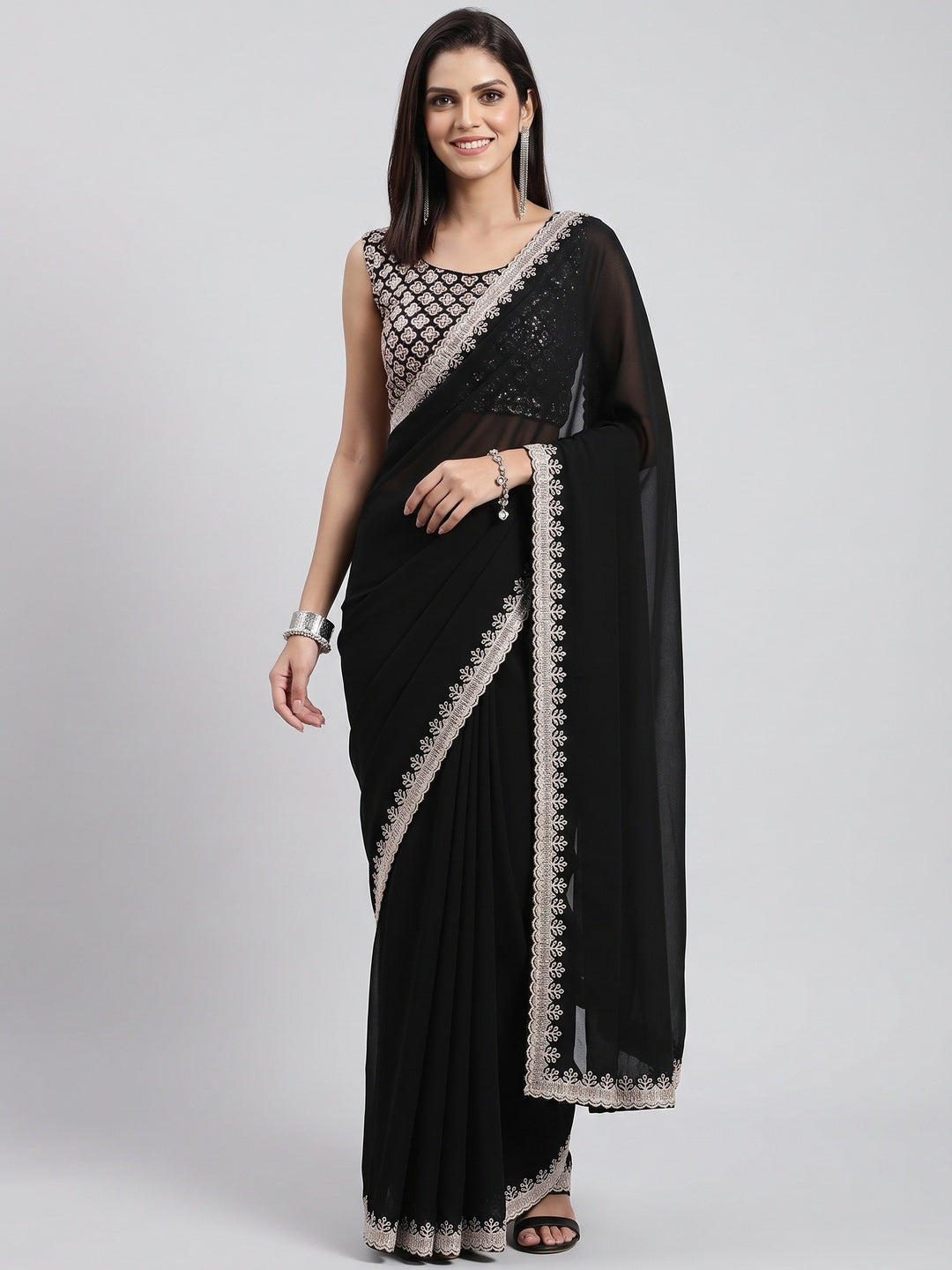 Black Georgette Saree With Sleek Solid Finish And Embroidered Edging - Image 1