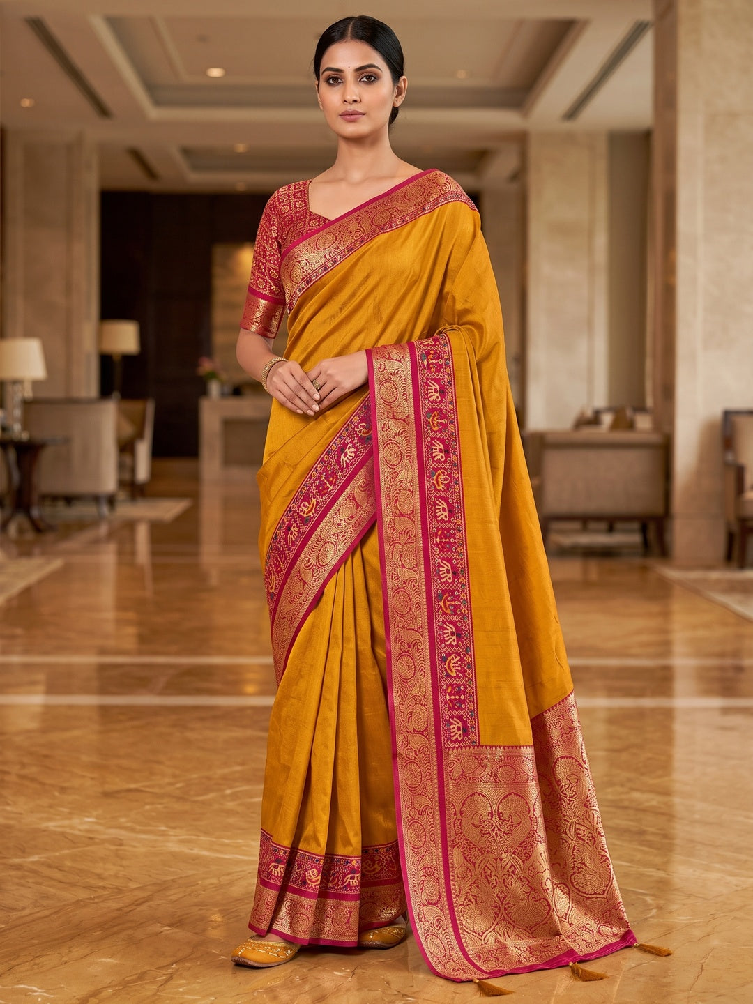 Peachmode Mustard Patola Border Art Silk Saree - Image 1