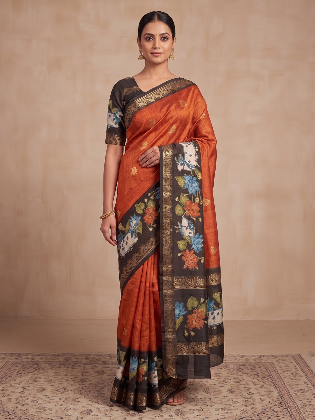 Peachmode Orange Cow Motif Border Art Silk Saree - Image 1