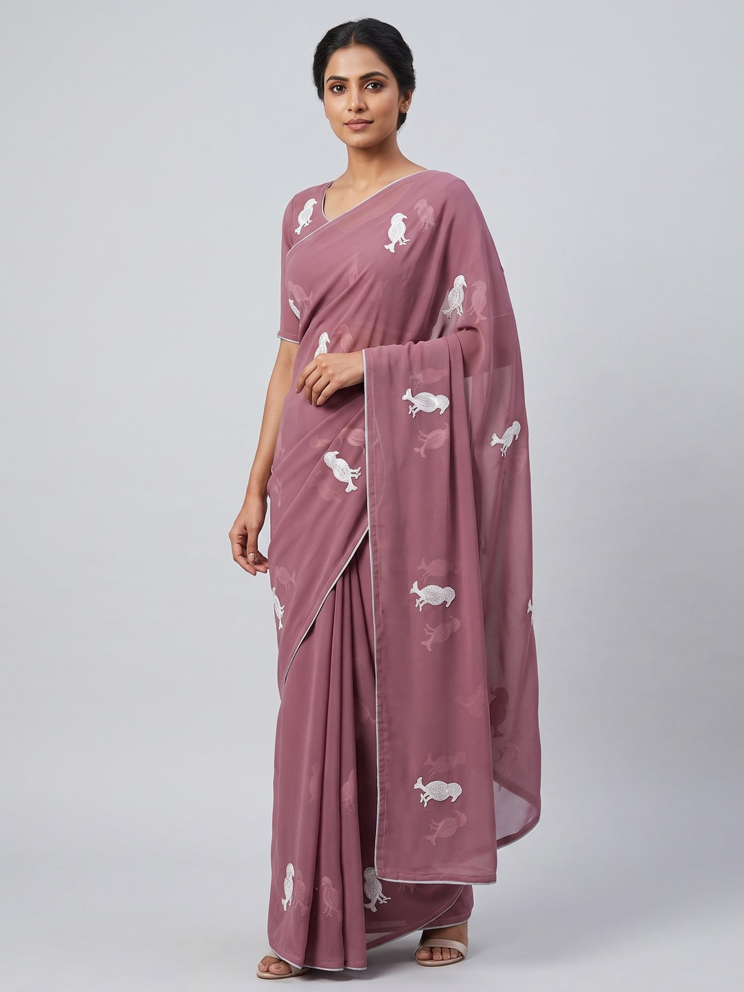 Mauve Georgette Saree Adorned With Elegant Bird Embroidery - Image 1