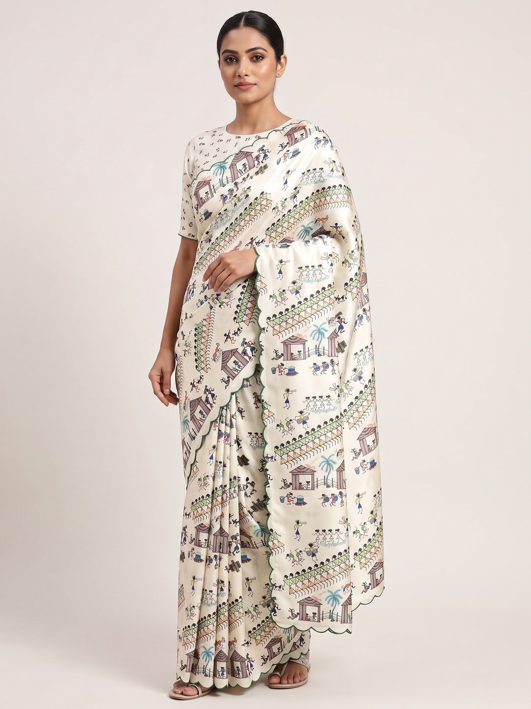 Sophisticated Off White Dola Silk Saree Adorned with Traditional Warli Patterns - Image 1