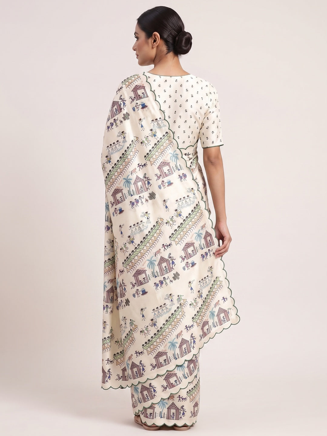 Sophisticated Off White Dola Silk Saree Adorned with Traditional Warli Patterns - Image 2