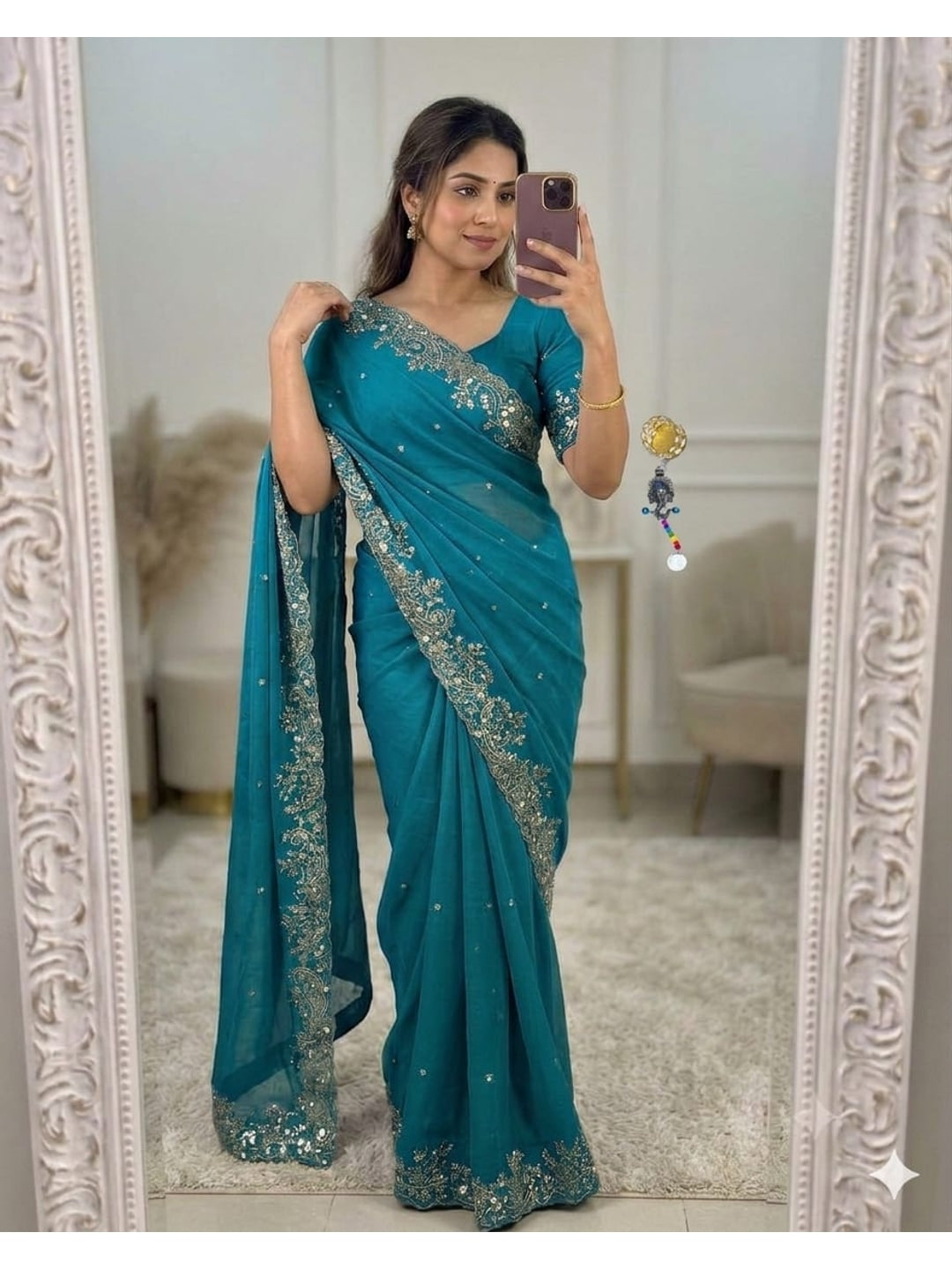 Peachmode Teal Sequin Embroidered Georgette Saree - Image 1