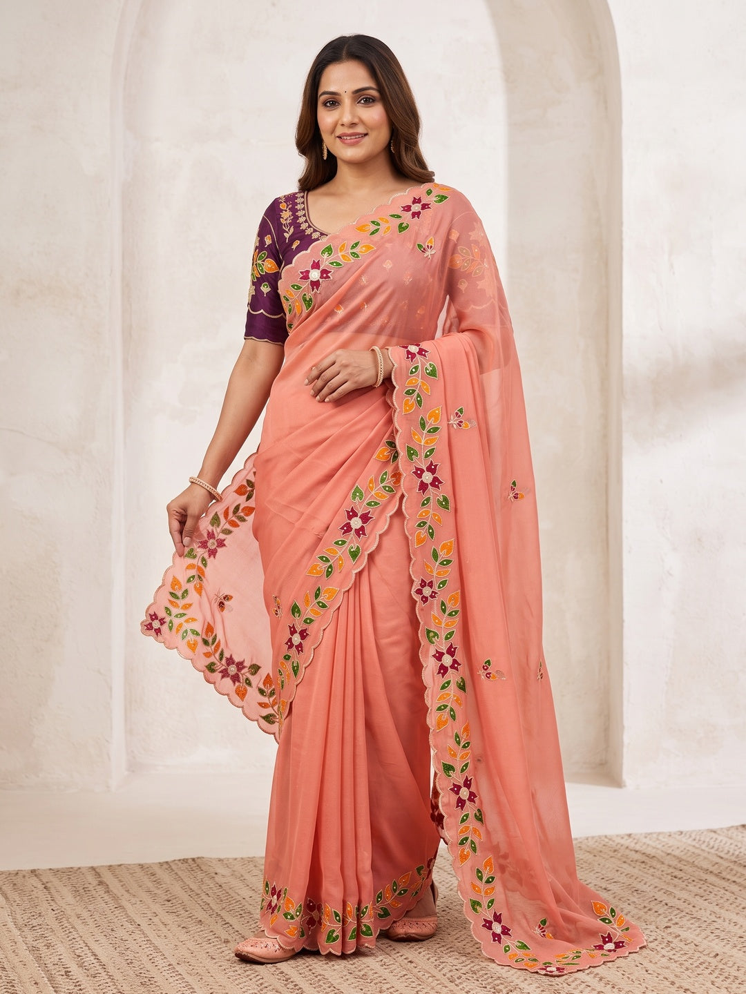 Peachmode Peach Embroidered Shining Georgette Saree - Image 1