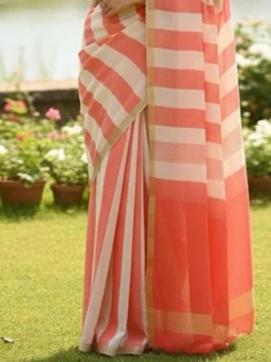 Lightweight Peach Linen Saree with Stylish Striped Motif Design - Image 1