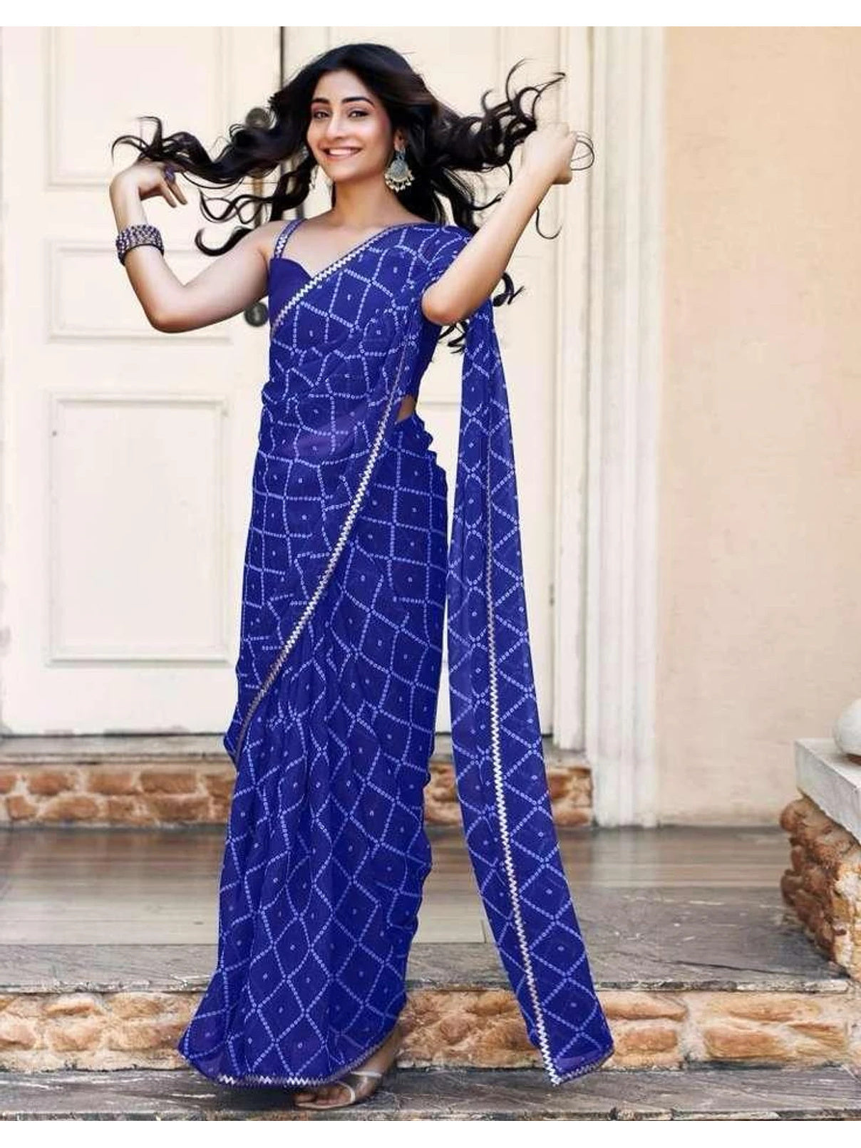 Peachmode Blue Georgette Bandhani Saree with Sequins Lace Border - Image 1