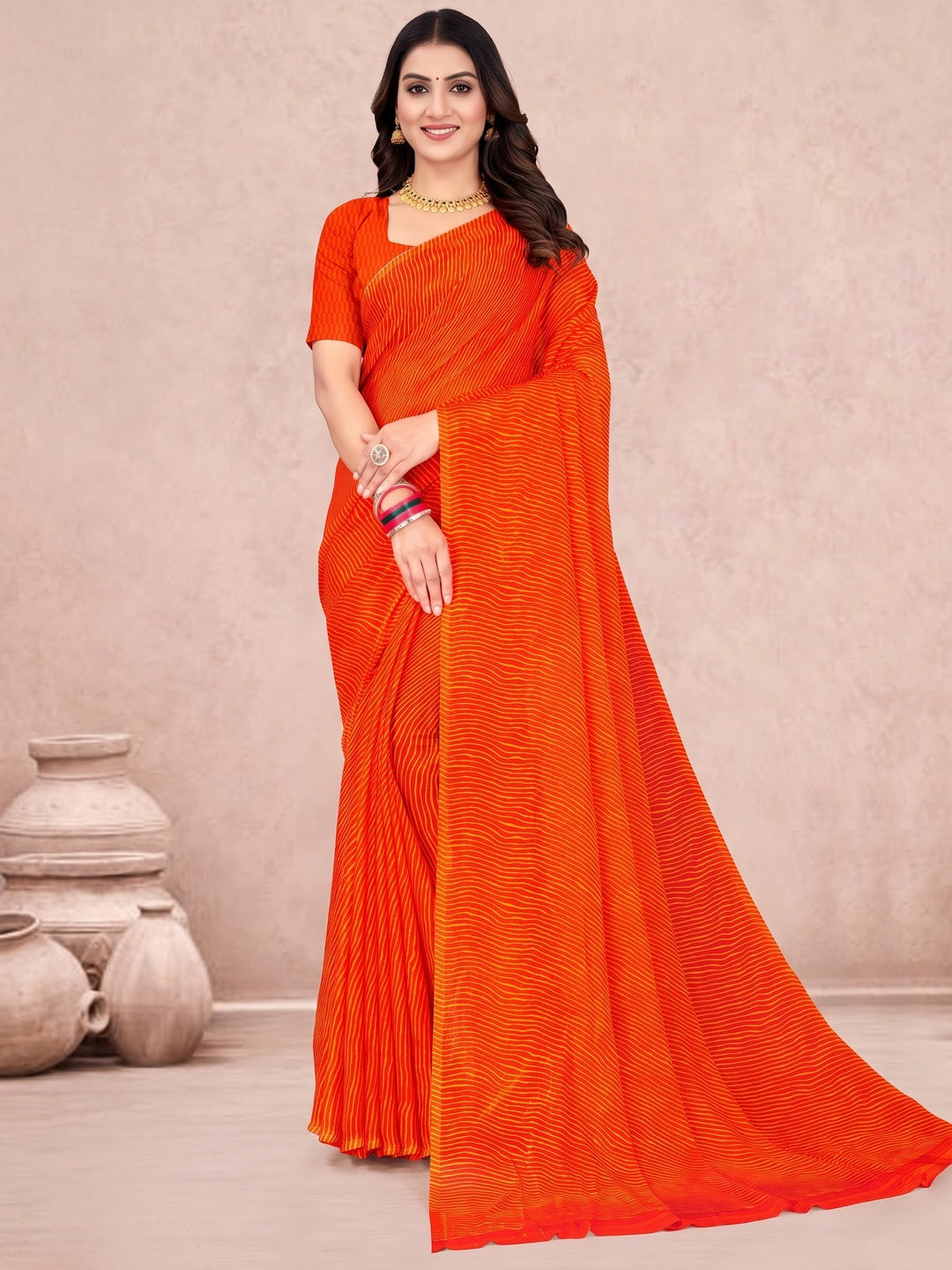 Chiffon Saree In Orange with Classic Leheriya Print - Image 1