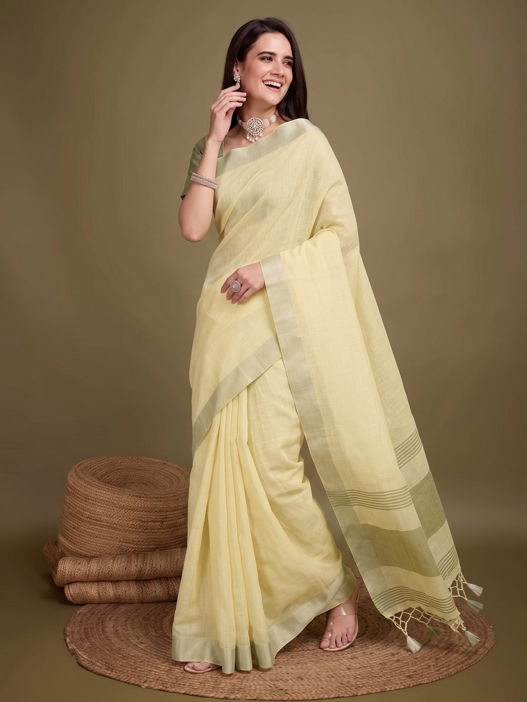 Sophisticated Yellow Linen Saree Featuring Intricate Zari Weaving & Tassel Accents - Image 4