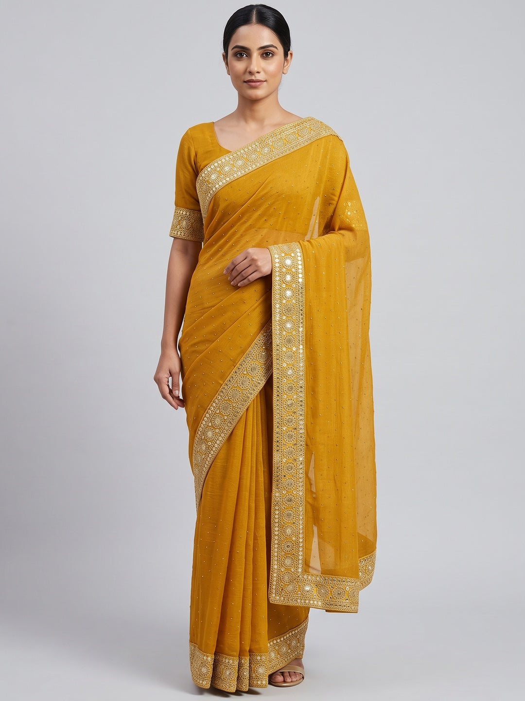 Graceful Mustard Chiffon Saree Adorned With Stonework & Sequins Embroidered Border - Image 1