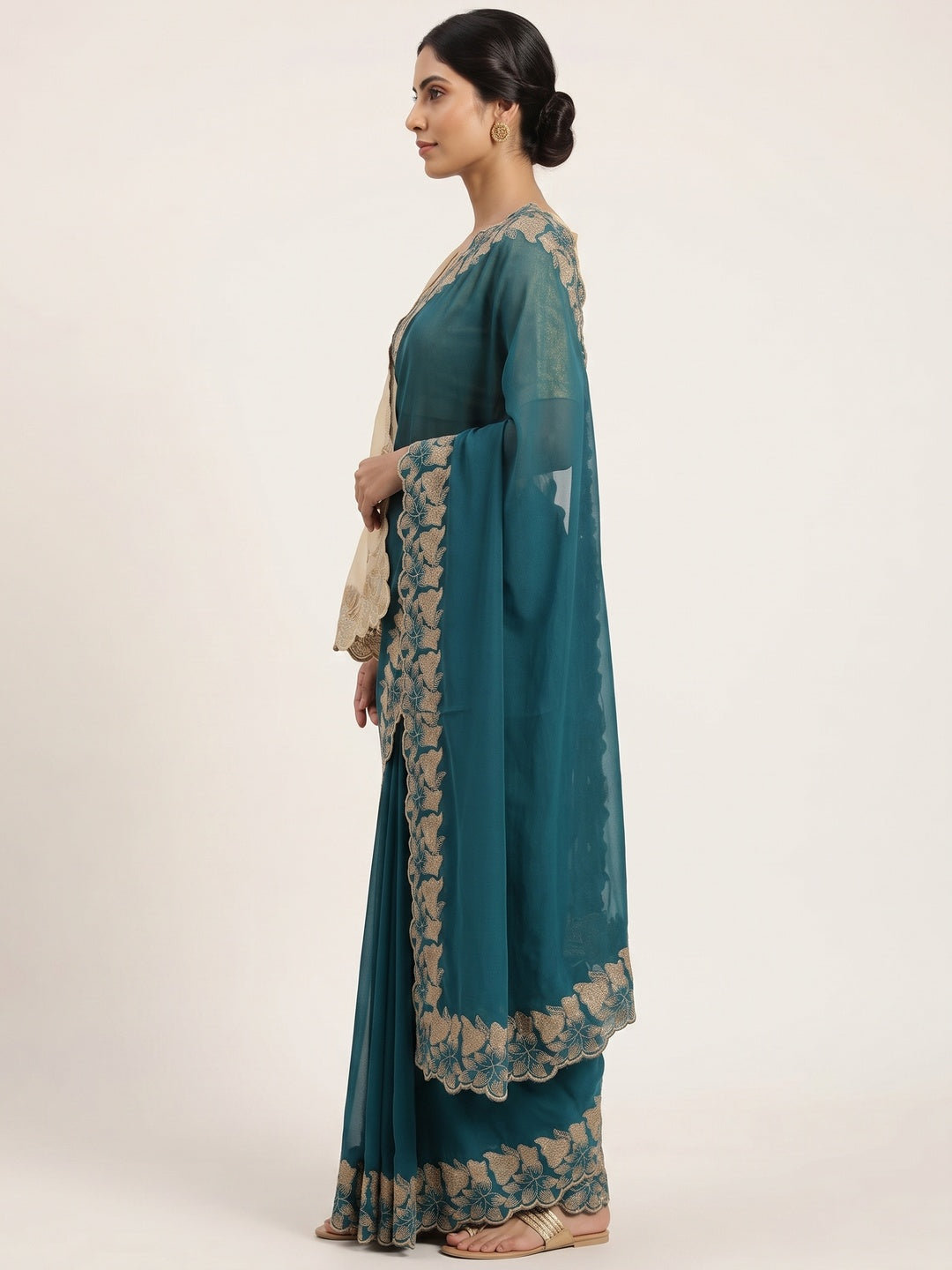 Elegant Teal Solid Georgette Saree Highlighted With A Delicate Floral Embroidered Border - Image 7