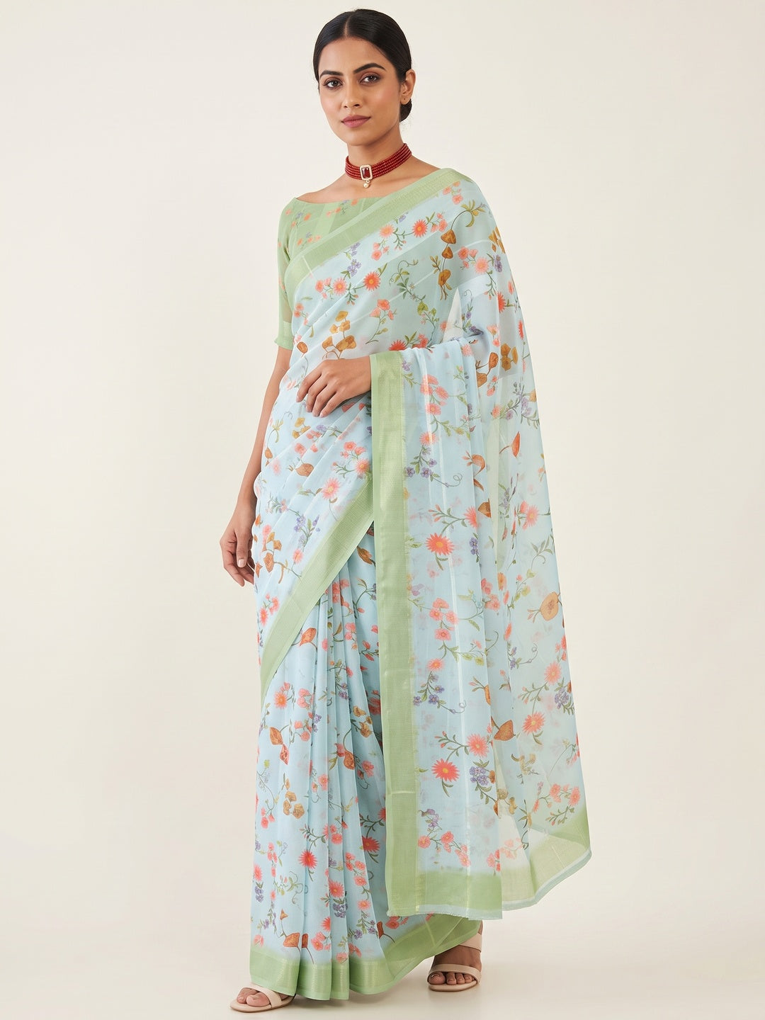 Sky Blue Bloom Floral Digital Printed Georgette Saree Accentuated With Graceful Zari Stripes - Image 1