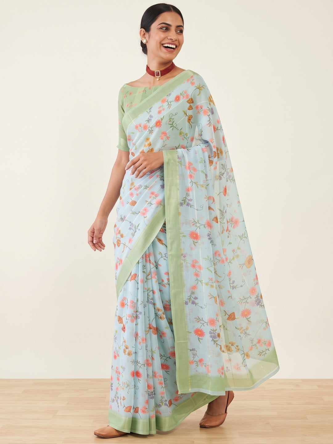 Sky Blue Bloom Floral Digital Printed Georgette Saree Accentuated With Graceful Zari Stripes - Image 4