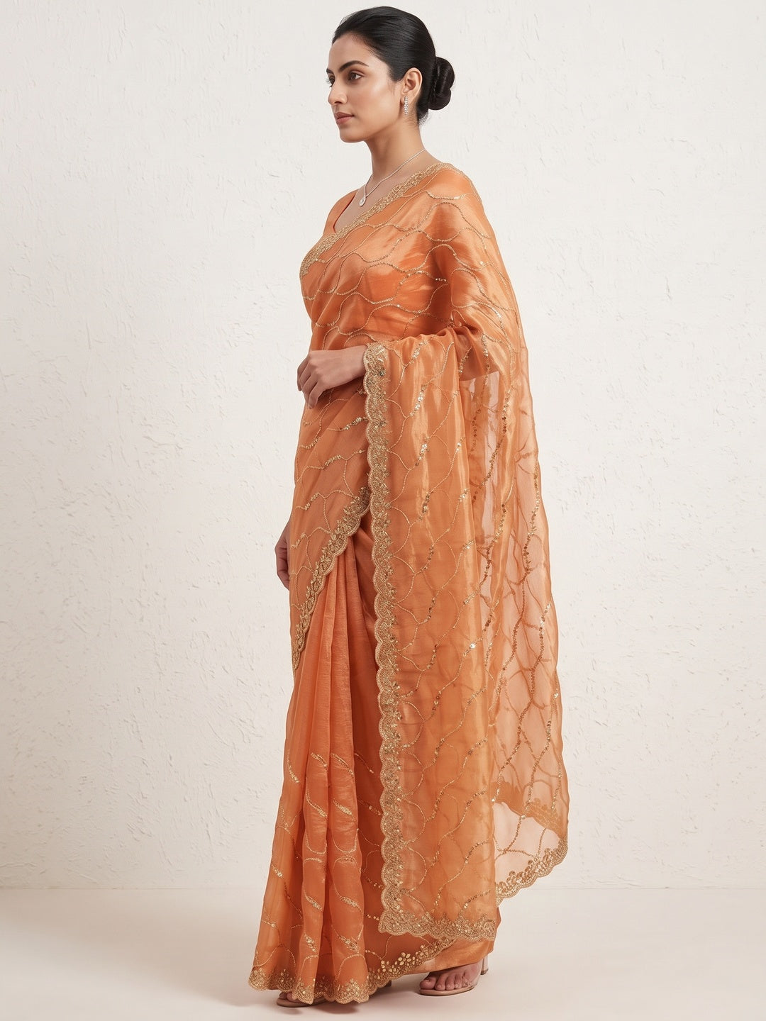 Orange Partywear Organza Chiffon Silk Saree Highlighted with Fine Sequins Detailing - Image 3