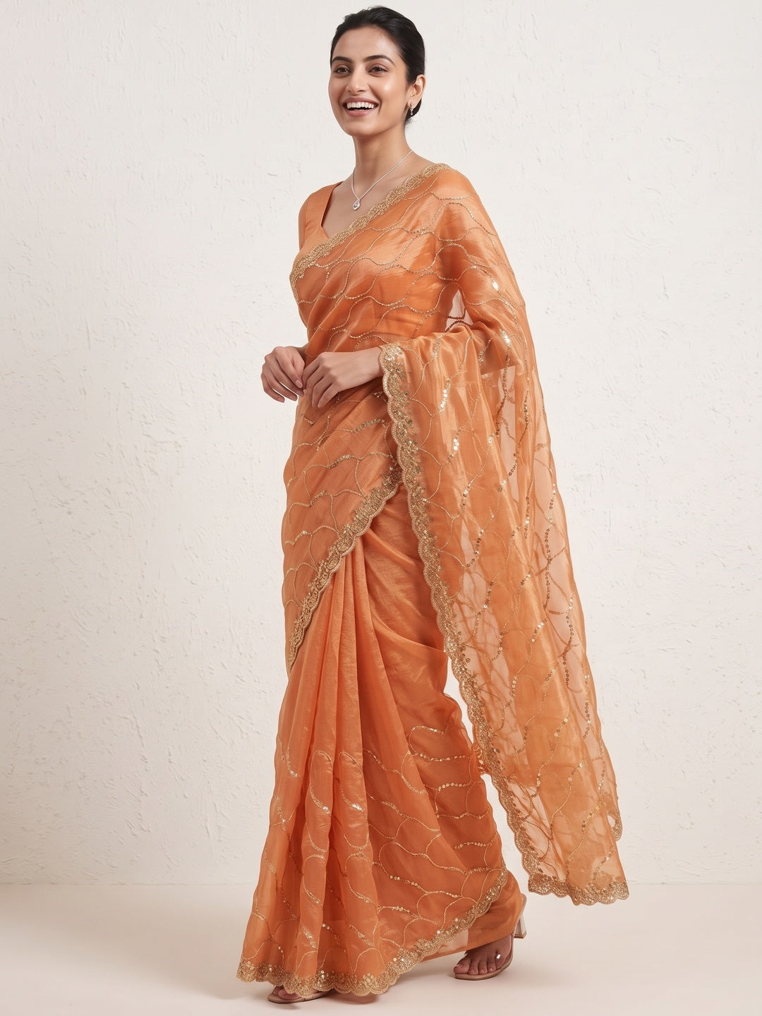 Orange Partywear Organza Chiffon Silk Saree Highlighted with Fine Sequins Detailing - Image 4