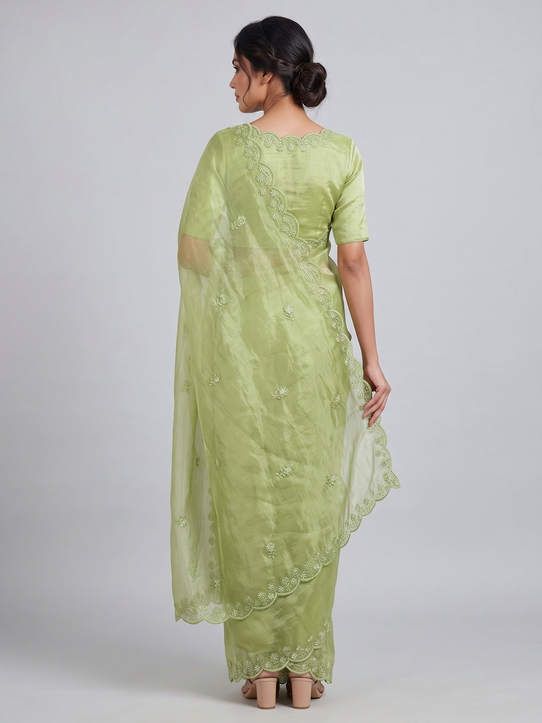 Green Net Partywear Saree Featuring Fine Floral Embroidery and a Soft, Flowing Look - Image 2