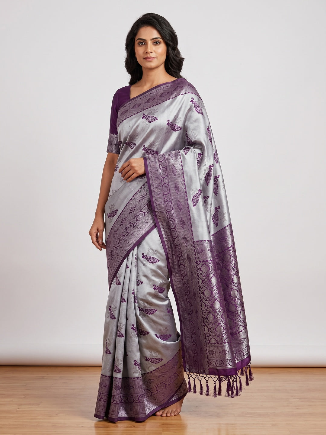 Grey Banarasi Silk Saree Featuring Zari Weaving Peacock Pattern & Luxe Tassels - Image 1