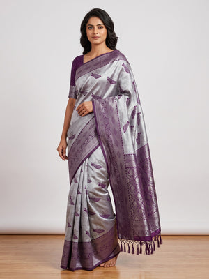 Grey Banarasi Silk Saree Featuring Zari Weaving Peacock Pattern & Luxe Tassels - Image 1