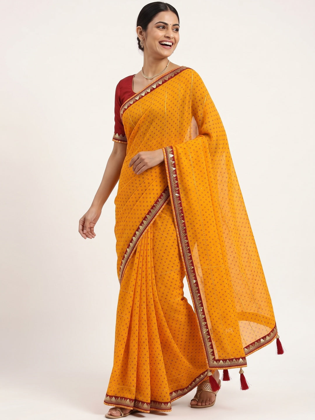 Charming Mustard Bandhani Printed Georgette Saree With Glittering Sequins & Zari Border - Image 4