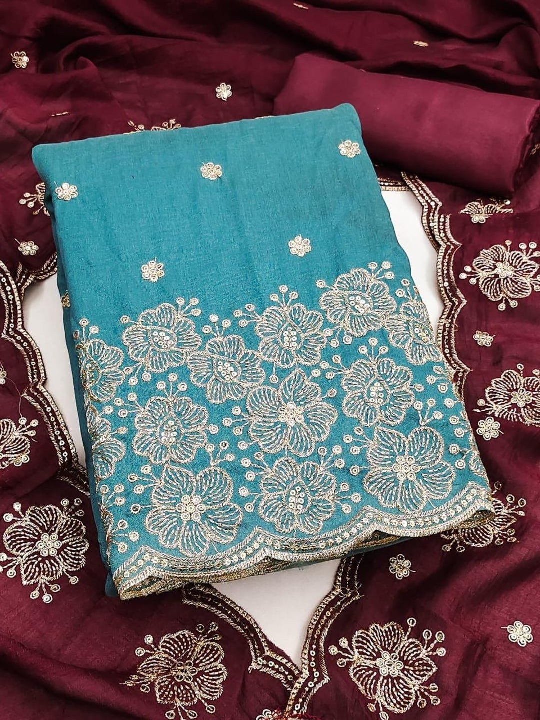 Peachmode Turquoise & Wine Embroidered Vichitra Silk Dress Material - Image 1