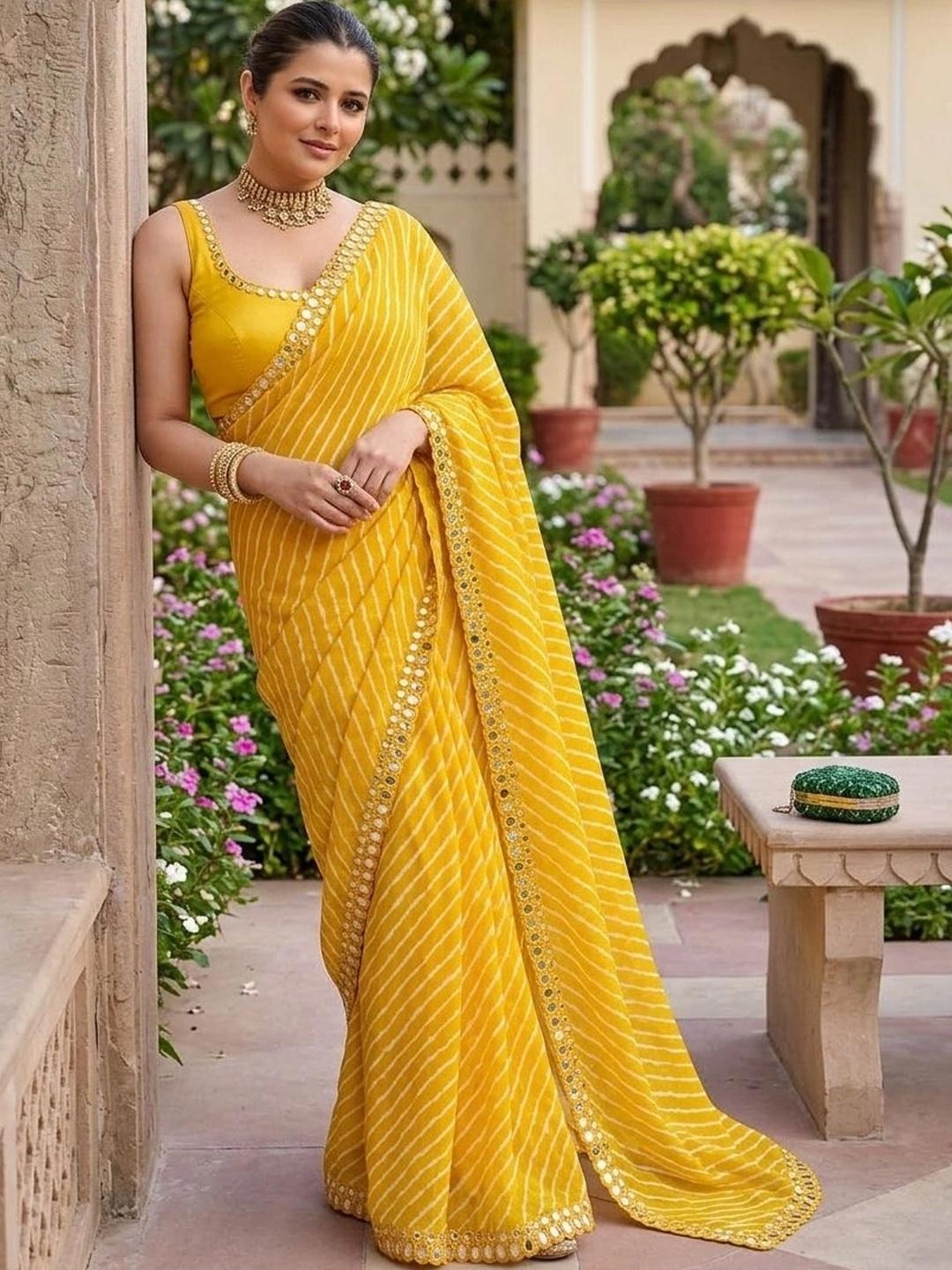 Peachmode Yellow Lehariya Printed Georgette Saree With Mirror Border - Image 4