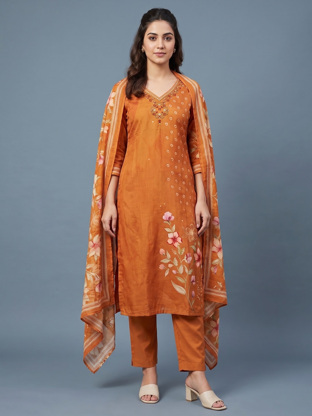 Peachmode Orange Muslin Embroidered Neck Salwar Suit - Image 1