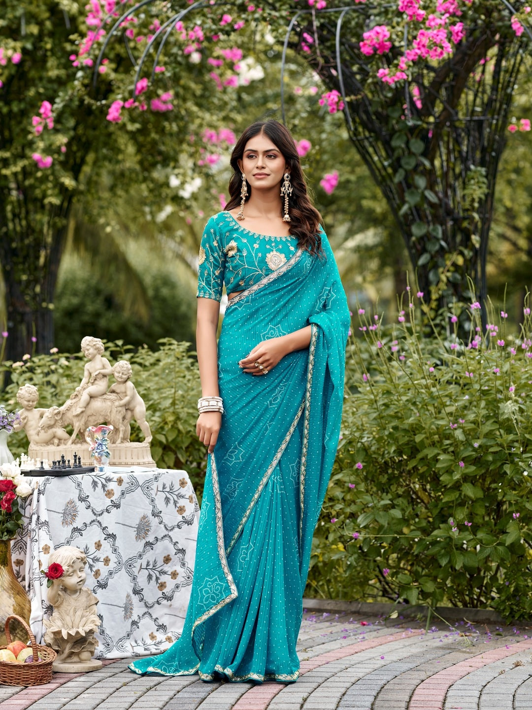 Peachmode Turquoise Bandhani Printed Georgette Saree With Embroidered Border - Image 2