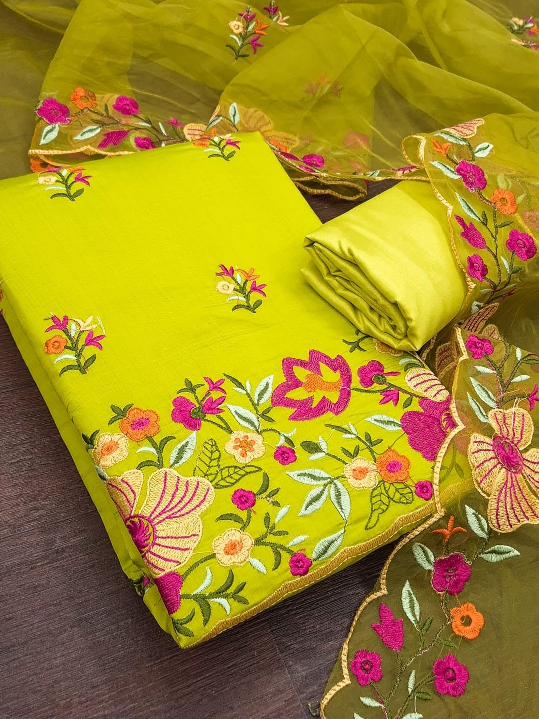 Peachmode Lime Green Roman Silk Unstitched Dress Material With Multi Thread Work And Organza Dupatta - Image 1
