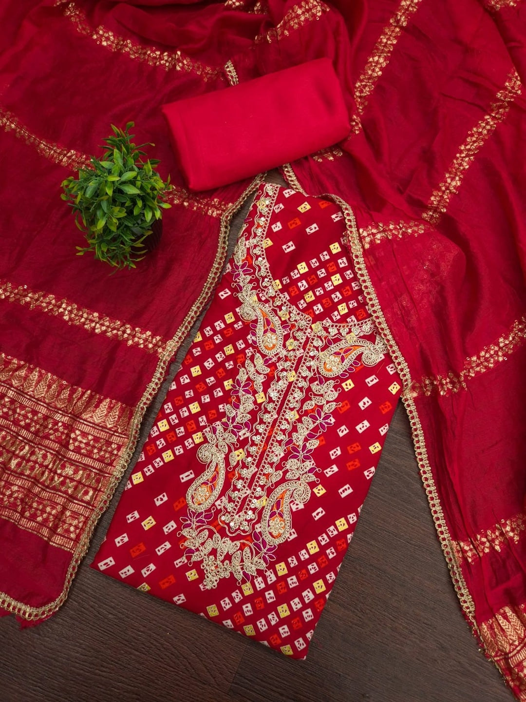 Peachmode Red Rayon Bandhani Print Unstitched Dress Material With Zari Neck Embroidery - Image 1