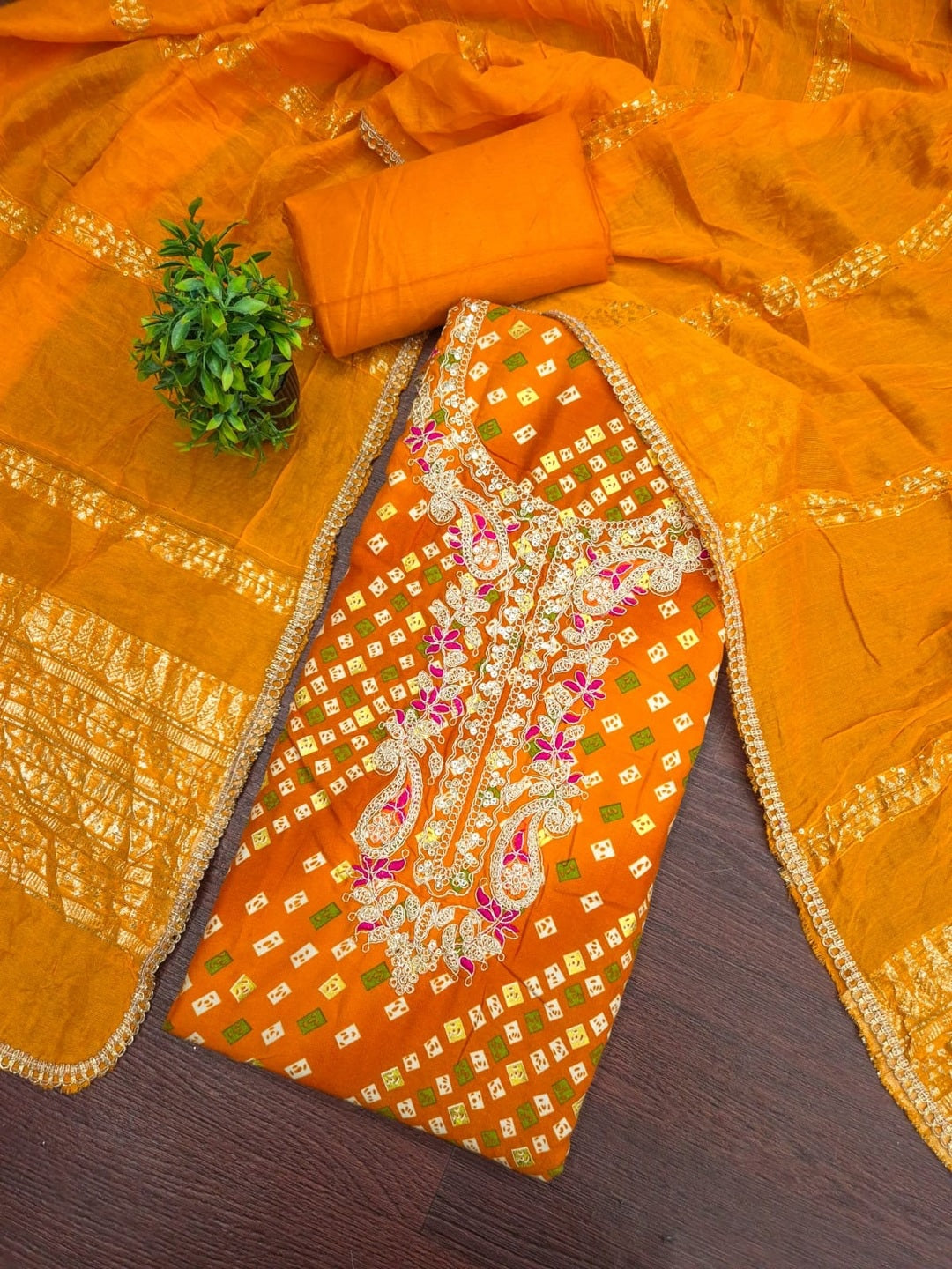 Peachmode Orange Rayon Bandhani Print Unstitched Dress Material With Zari Neck Embroidery - Image 1