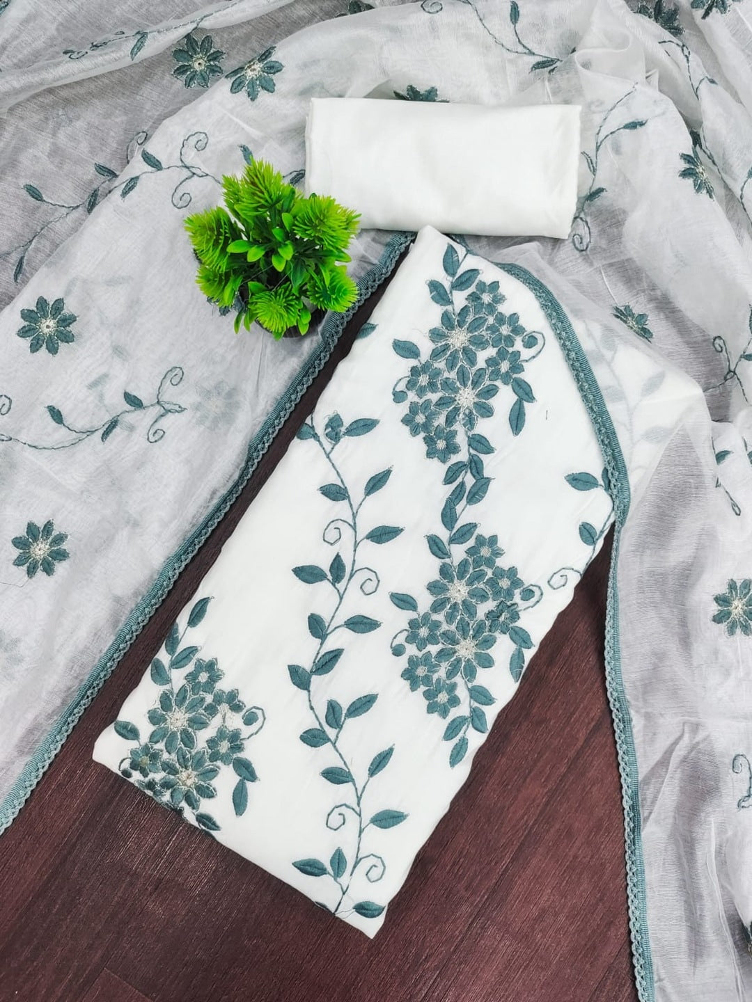 Peachmode Teal Roman Silk Unstitched Dress Material With Contrast Floral Vine Embroidery - Image 1
