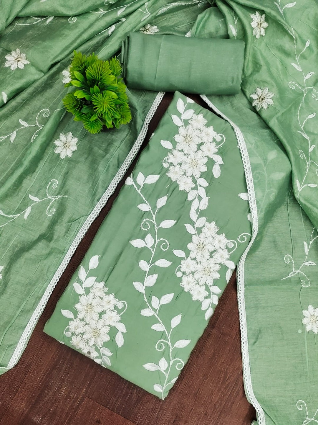 Peachmode Green Roman Silk Unstitched Dress Material With White Floral Vine Embroidery - Image 1