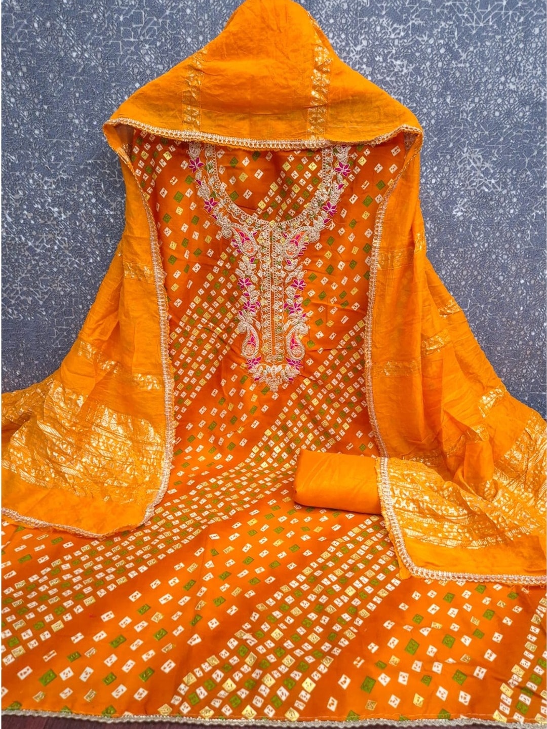 Peachmode Orange Rayon Bandhani Print Unstitched Dress Material With Zari Neck Embroidery - Image 5