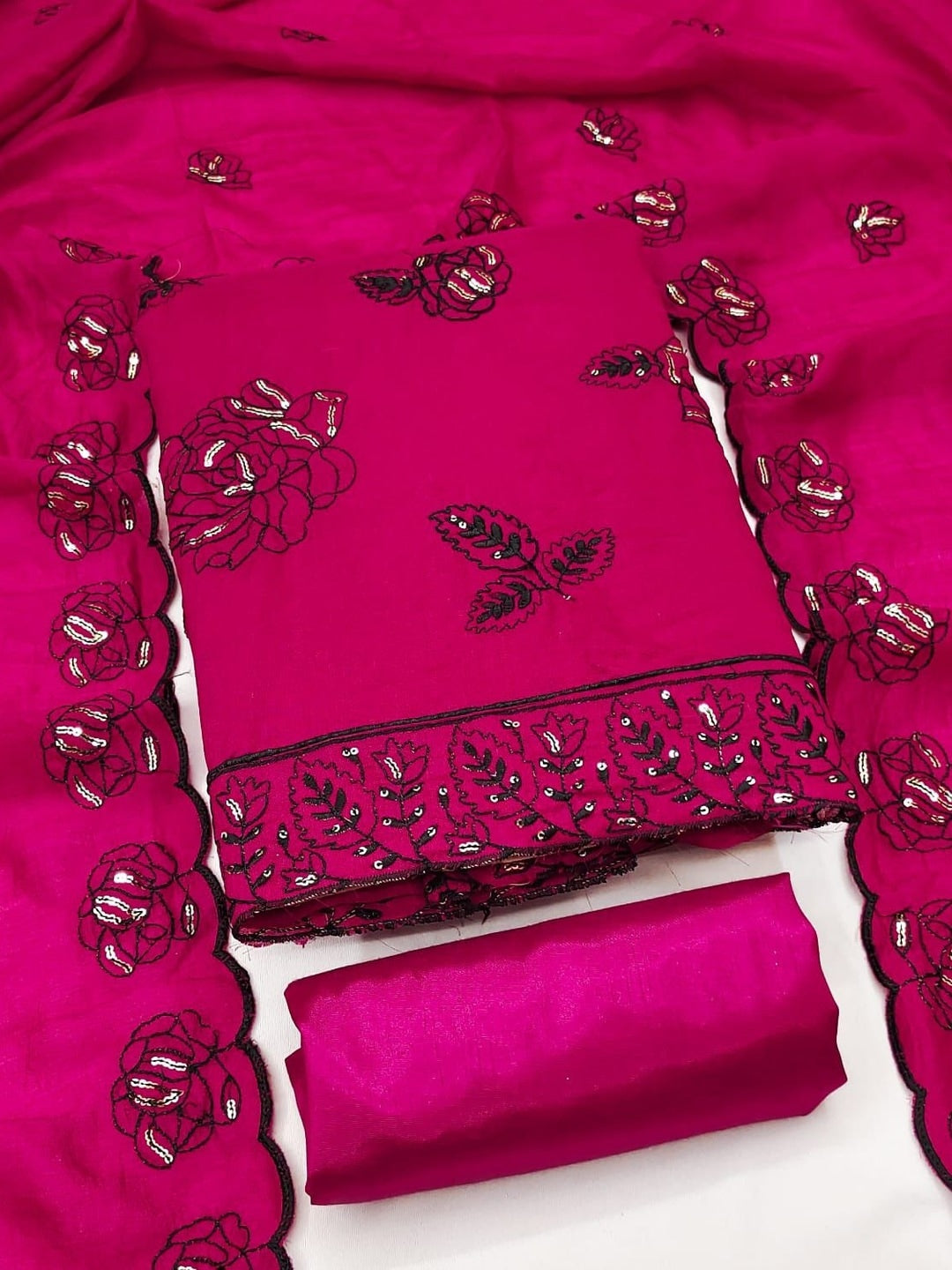 Peachmode Rani Pink Vichitra Silk Unstitched Dress Material With Black Floral Sequence Work And Scalloped Embroidered Dupatta - Image 1