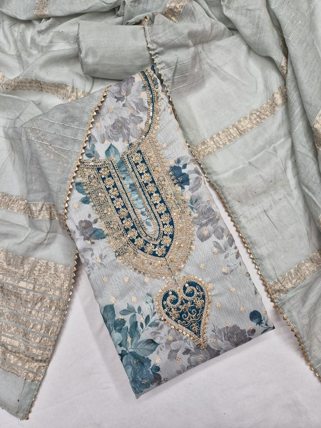 Peachmode Powder Blue Chanderi Jacquard Unstitched Dress Material With Floral Print And Embroidered U Neck And Lace Edge Dupatta - Image 4