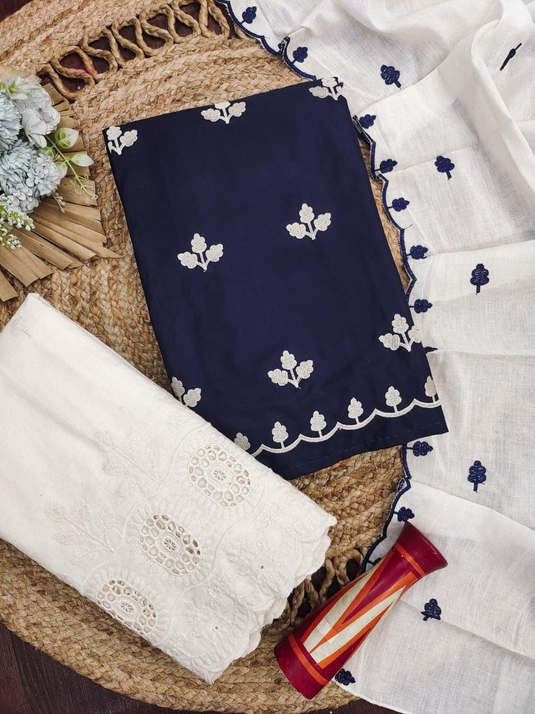 Peachmode Navy Blue Poly Rayon Unstitched Dress Material With Leaf Buti Embroidery And Schiffli Cambric Cotton Bottom And Dupatta - Image 1