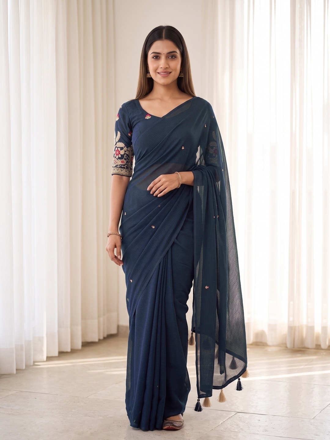 Peachmode Navy Blue Weightless Georgette Saree With Tassels And Heavy Embroidery Blouse - Image 1